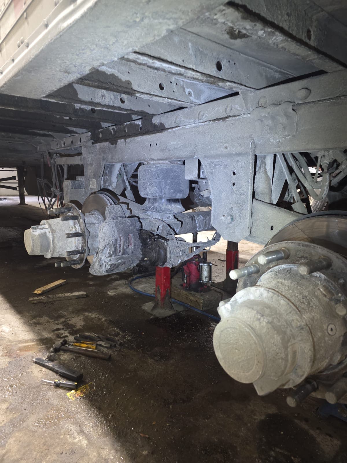 Technician performing heavy-truck brake service